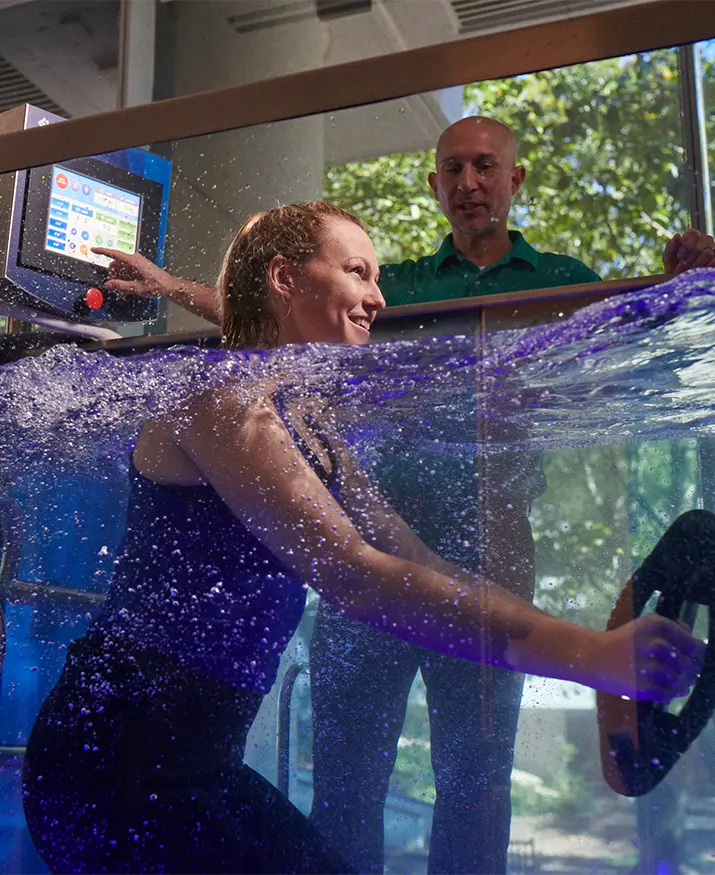 patient using weights in aquatic treadmill