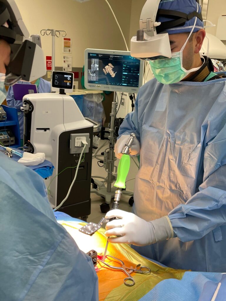 Spine surgeon using augmented reality in surgery