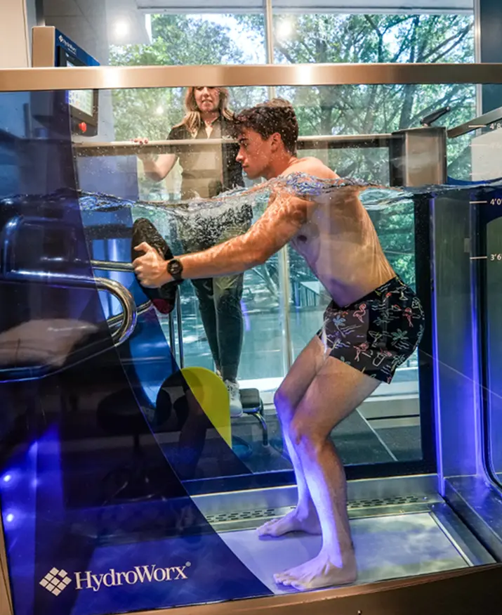 athlete training in aqautic treadmill