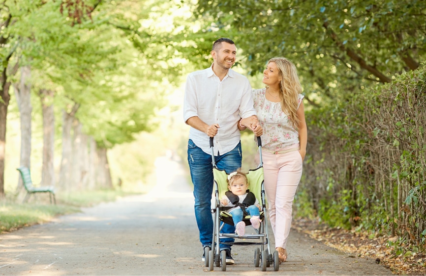 parents walking with their child