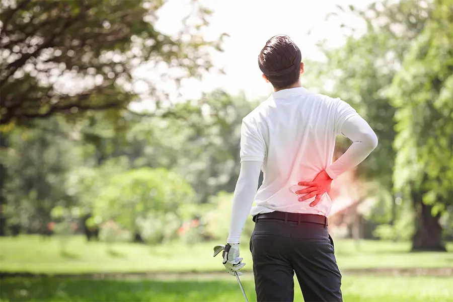 golfer preventing low back pain