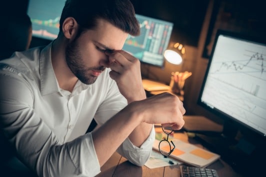 headache male at desk