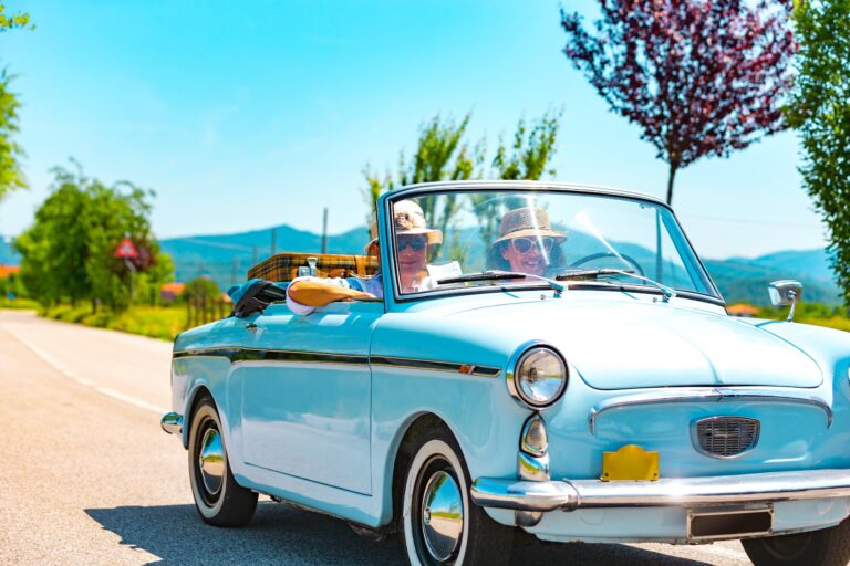 Classic car on a summer road trip