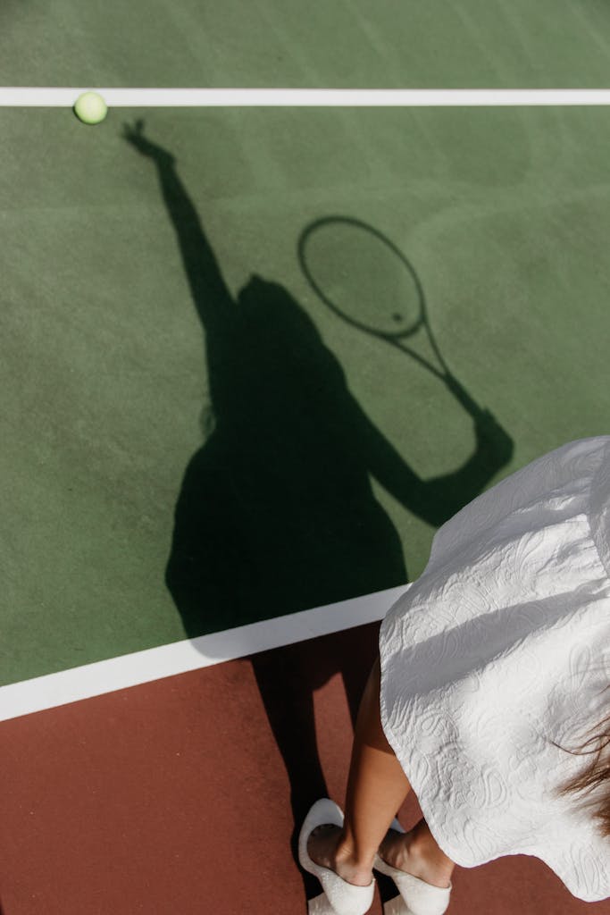 Shadow of Woman Playing Tennis