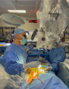 spine surgeon performing disc replacement