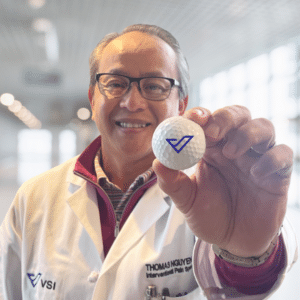 Dr. Nguyen Holding Golf Ball