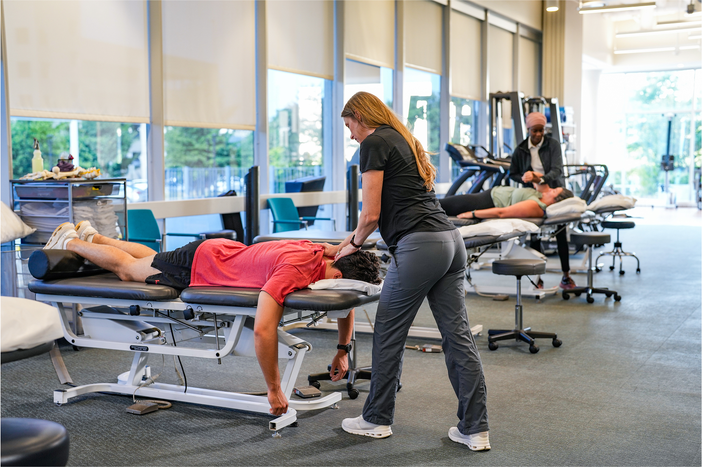 male receiving manual therapy for cervical spine
